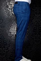 Au Noir men's blue textured dress pants with belt loops, back welt pocket and black waistband patch shown from the side