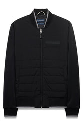 Men's black zip-front windbreaker jacket with hem, cuffs, striped rib collar and quilted front, product view by Psycho Bunny