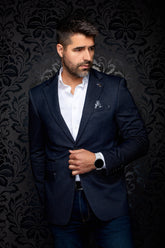 Au Noir men's navy micro-check blazer front view with notched lapels, lapel pin, and flap pockets