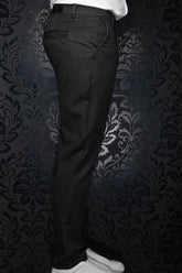 Au Noir men's black pants with belt loops, rear welt pocket, and curved side pocket stitching shown from the side