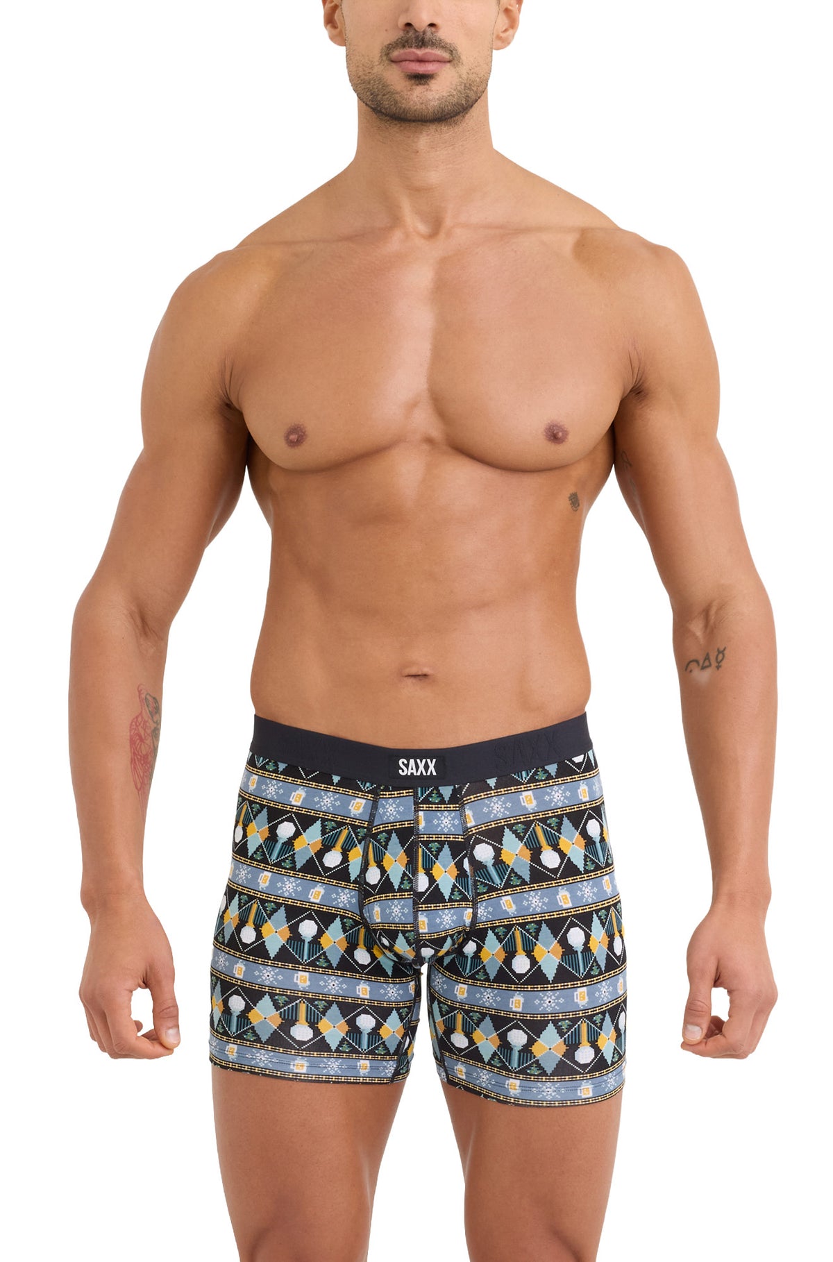 Front model view of men's black patterned boxer winter boxer briefs with long legs and SAXX waistband