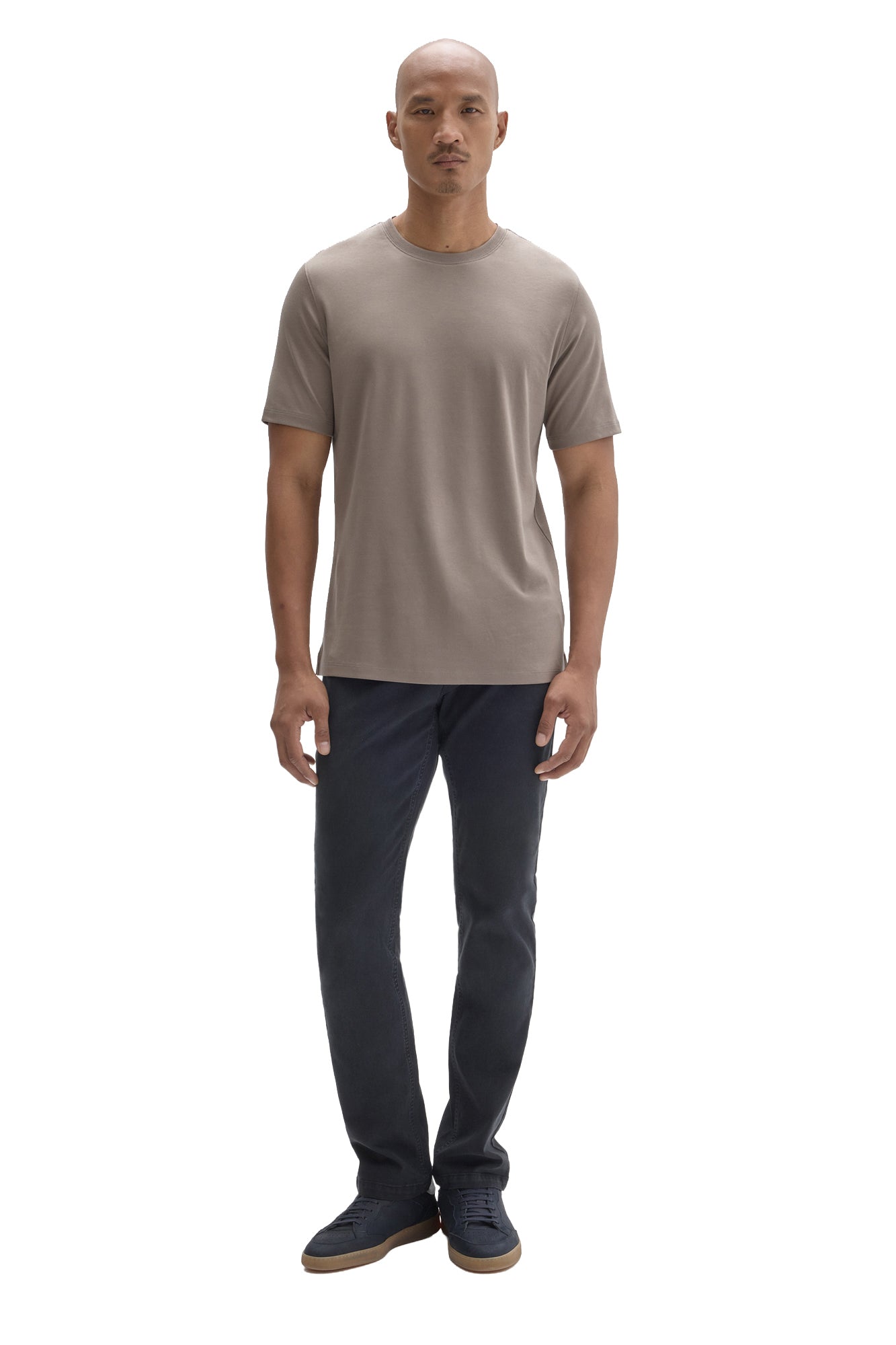 Robert Barakett men's full-body front view of taupe grey short sleeve crewneck T-Shirt styled with dark pants