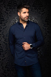 Au Noir men's navy long sleeve button-up shirt with small orange dot pattern, shown from the front on model
