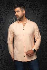 Au Noir men's peach long sleeve button-up shirt with pointed collar and glossy buttons on model, front view