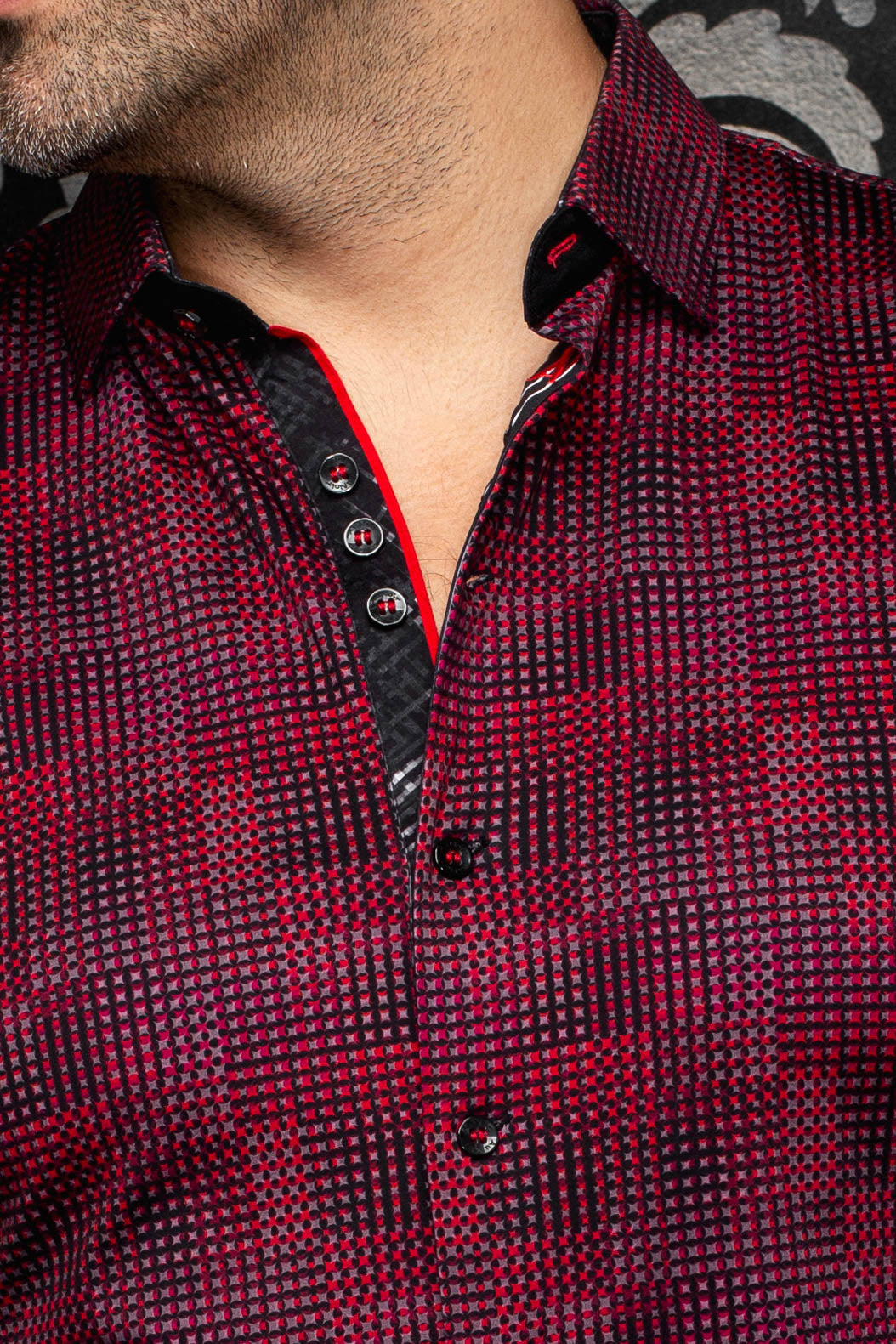 Au Noir men's red and black micro-check shirt collar, black placket, buttons, and red piping, close-up