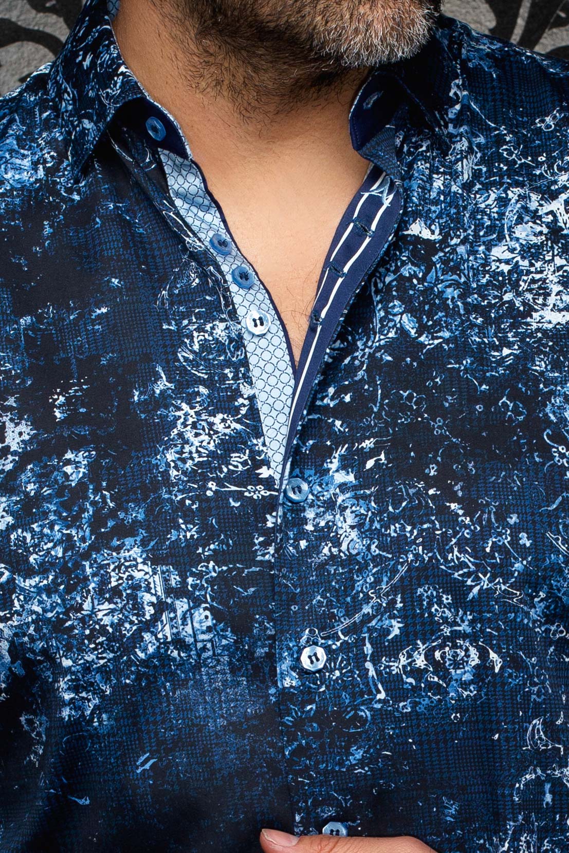 Au Noir men's navy abstract-print shirt collar, blue buttons, and contrast inner placket, close-up