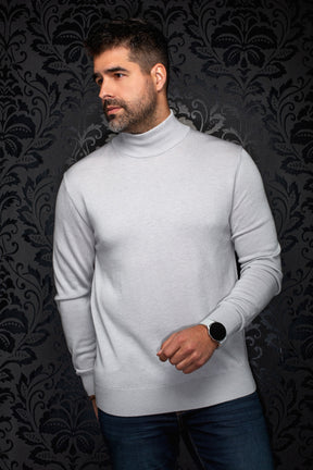 Men's light gray turtleneck knit merino sweater shown from the front with ribbed cuffs and hem by Au Noir