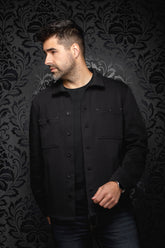 Au Noir men's black overshirt on model, front view showing collar, button placket and chest pockets