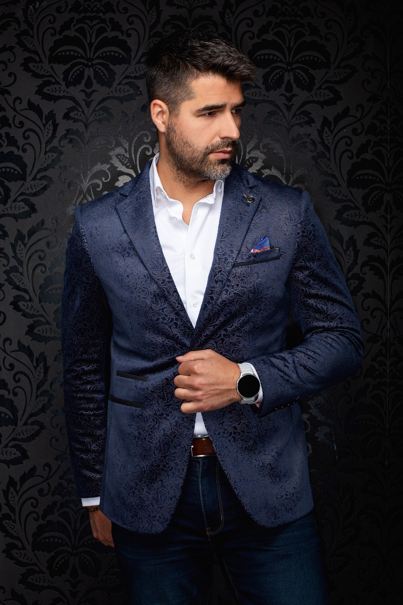 Au Noir men's navy paisley blazer with notched lapels, chest pocket, and black welt trim shown from the front