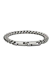 Men's isolated silver curb chain bracelet with polished links, front clasp and engraved Au Noir plates