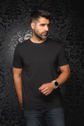 Men's black Short-sleeve T-Shirt on model, front view with crewneck and straight silhouette by Au Noir