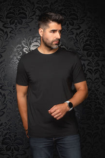 Men's black Short-sleeve T-Shirt on model, front view with crewneck and straight silhouette by Au Noir