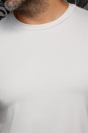 Au Noir men's light gray crewneck Short-sleeve T-Shirt showing the ribbed collar and smooth jersey texture, close-up