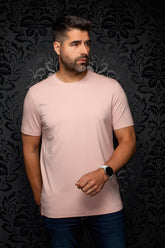Au Noir men's pale pink short sleeve crewneck T-Shirt with straight hem on model, front view