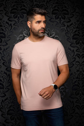 Au Noir men's pale pink short sleeve crewneck T-Shirt with straight hem on model, front view