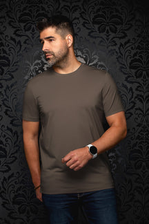 Men's brown Short-sleeve T-Shirt on model, with crewneck collar and straight hem visible, front view by Au Noir
