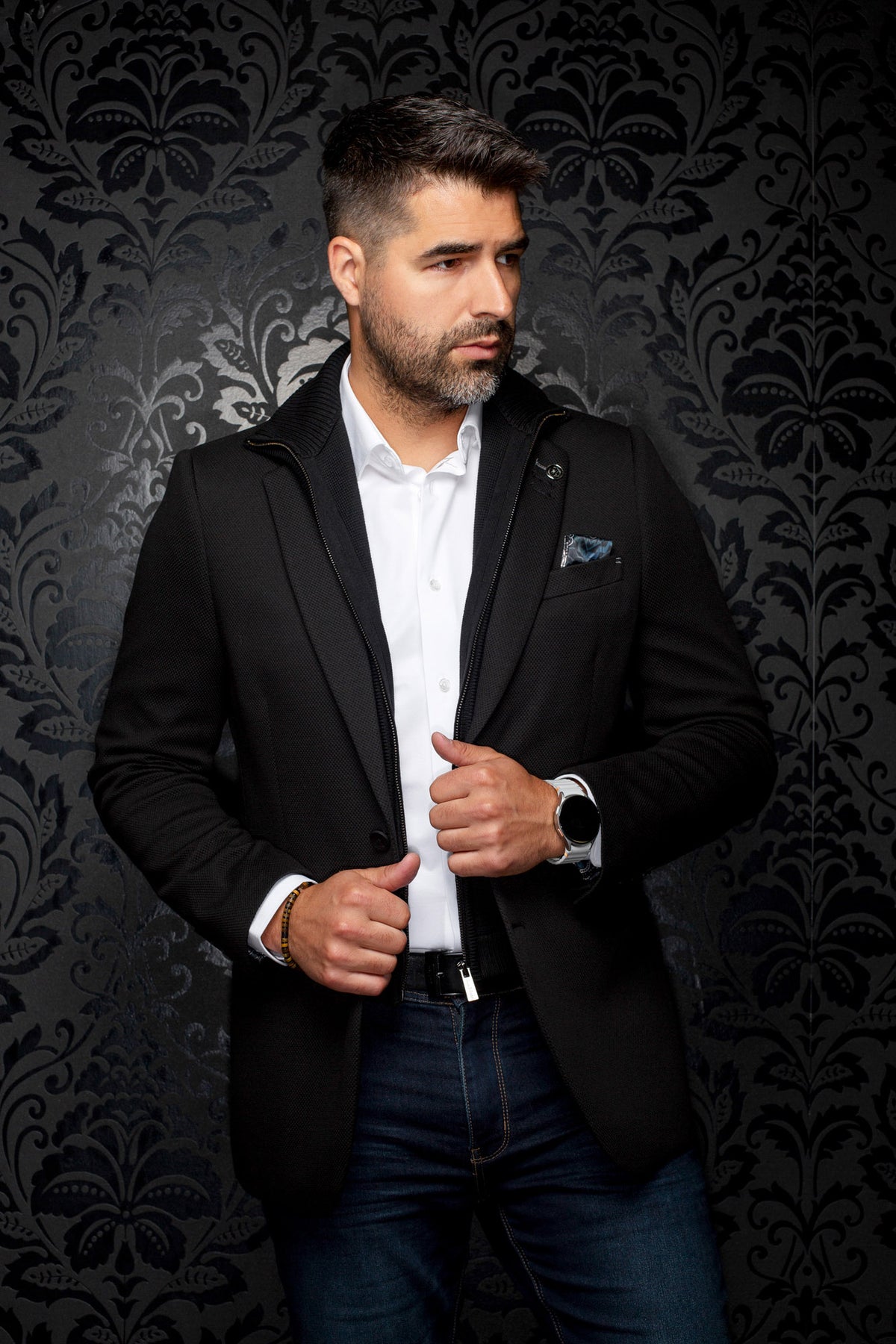 Au Noir men's black textured blazer with zip-front knit insert, centered front model view