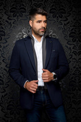 Au Noir men's navy textured blazer with notch lapels and a gray zip-front inner layer, front view