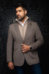 Front view of men's taupe textured blazer with notch lapels, front button and small lapel pin by Au Noir