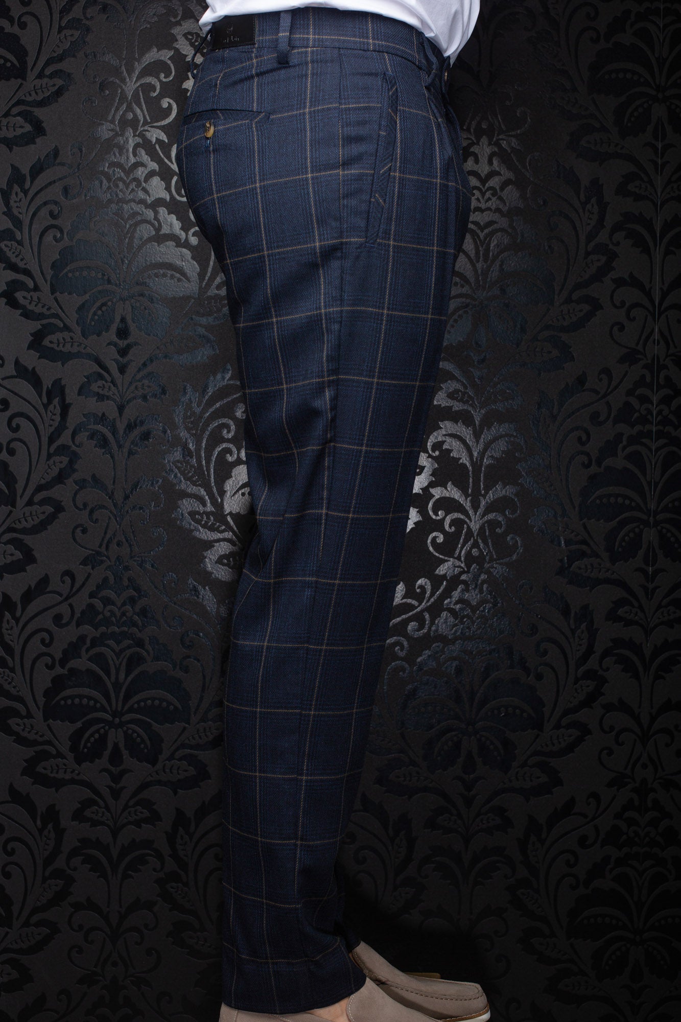 Au Noir men's navy plaid dress pants with belt loops, side pocket, and buttoned back welt pocket, side view