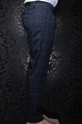 Au Noir men's navy plaid dress pants with belt loops, side pocket, and buttoned back welt pocket, side view