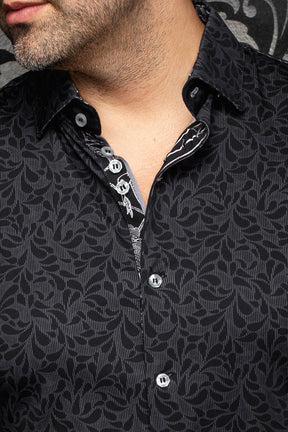 Au Noir men's black tonal floral button-up shirt collar, placket, light buttons, and contrast print, close-up