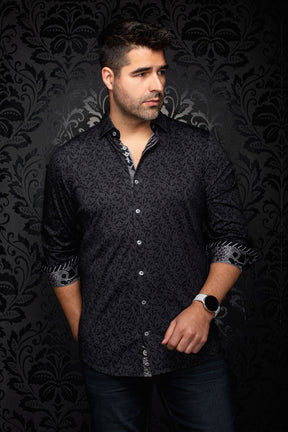 Men's black tonal floral button-up shirt, front model view with rolled contrast cuffs and light buttons by Au Noir