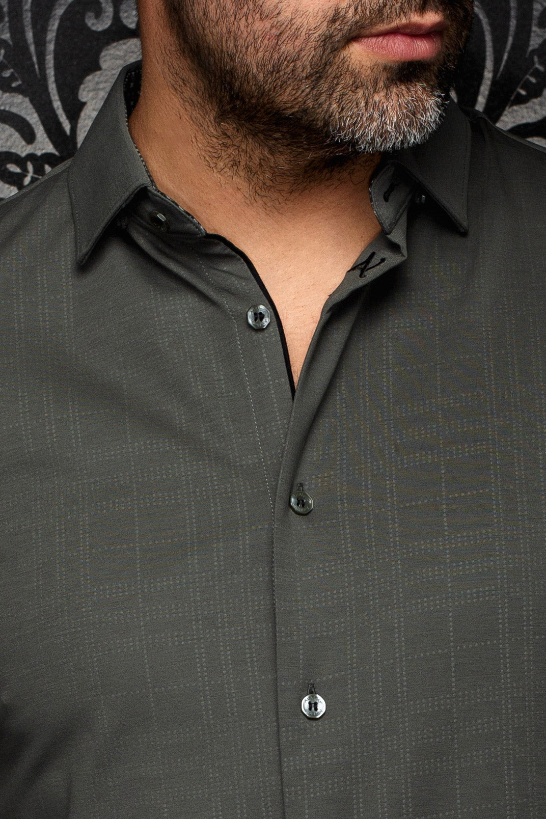 Au Noir men's olive green shirt collar, buttons, black inner trim, and tonal check texture, close-up