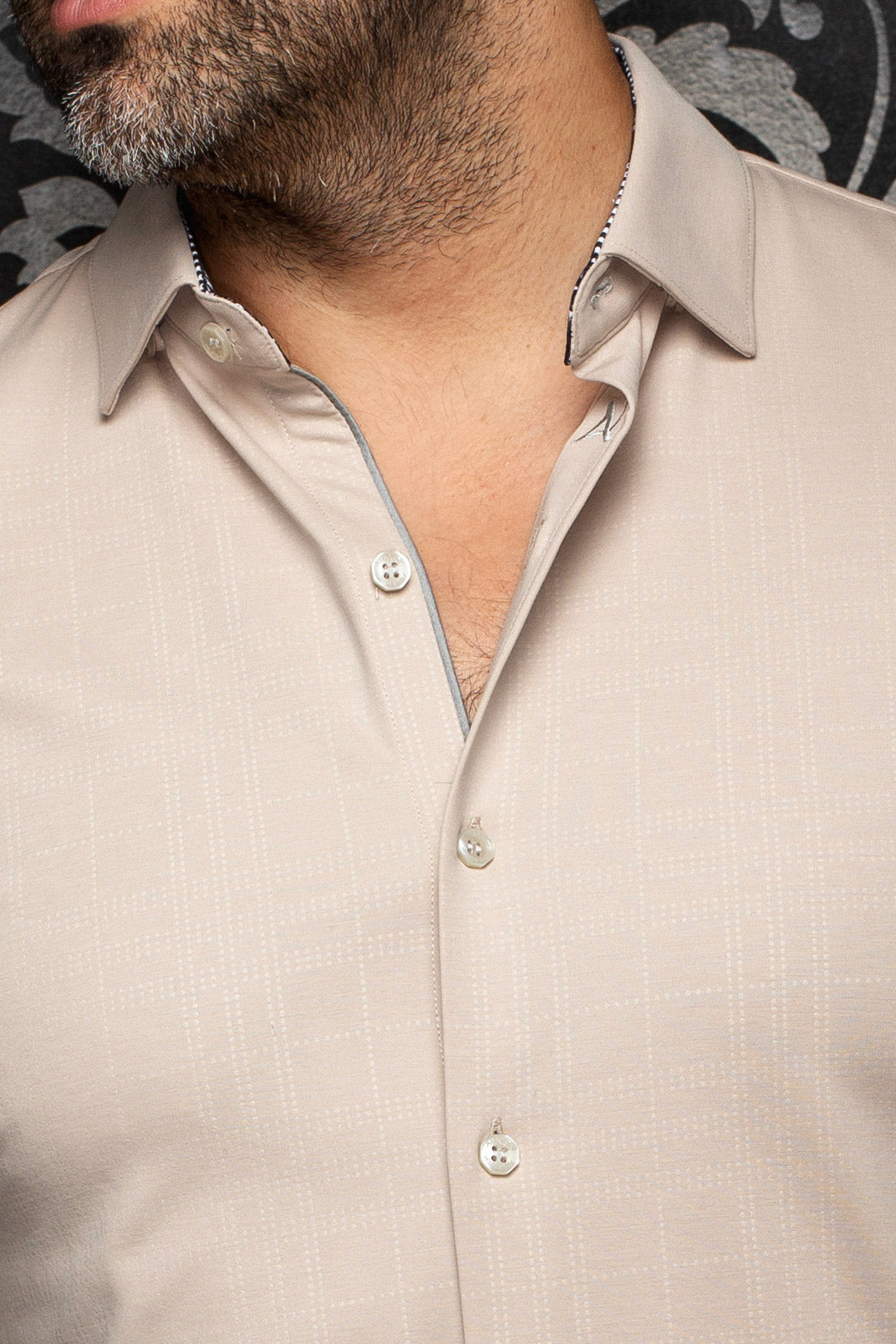 Au Noir men's beige button-up shirt collar, buttons, tonal grid texture, and contrast inner trim, close-up