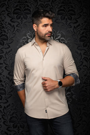 Au Noir men's beige button-up shirt front view with sleeves rolled to show black-and-white patterned cuffs