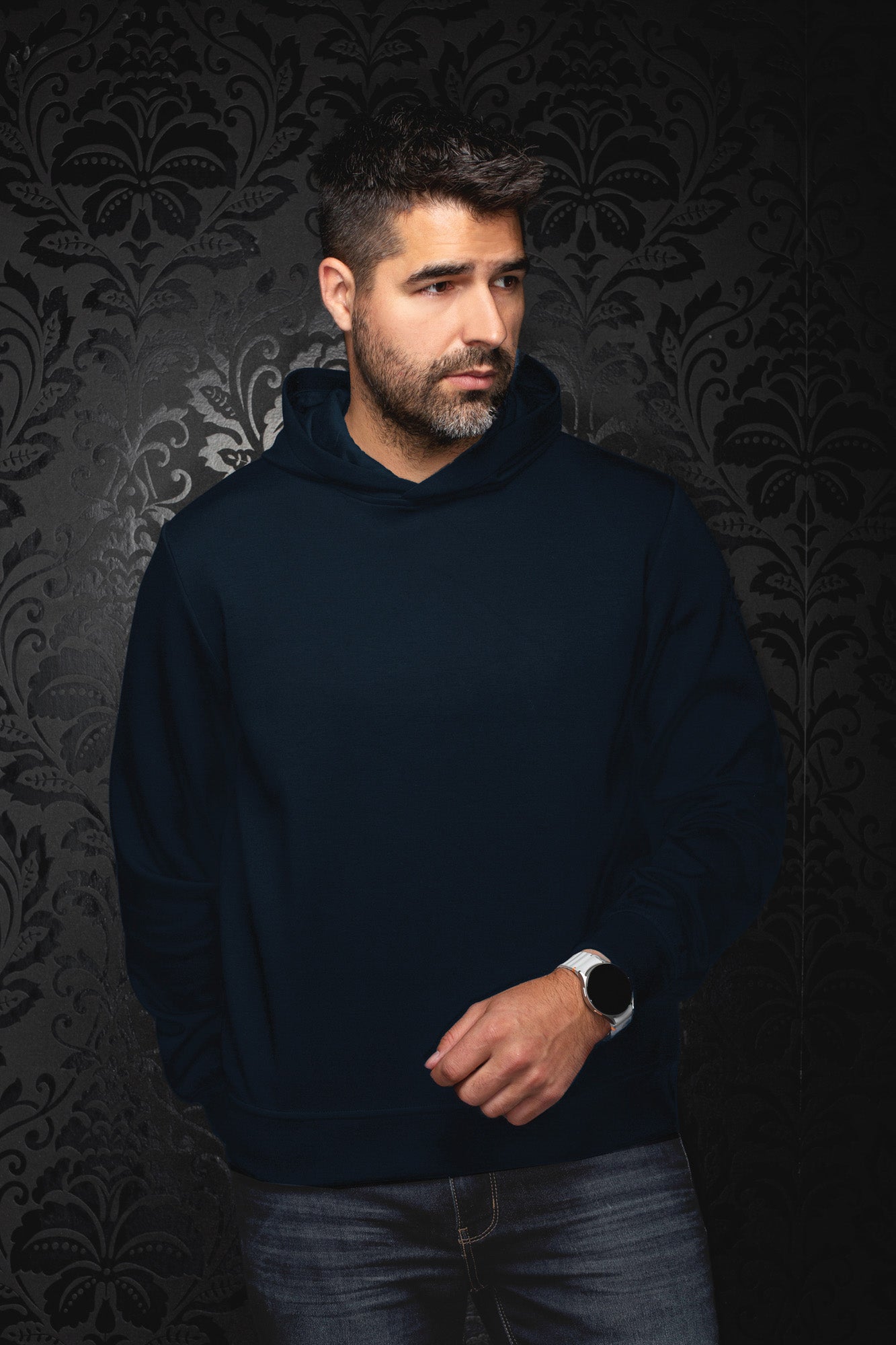 Au Noir men's navy pullover sports jacket with long sleeves, hooded neckline, and ribbed hem shown from the front