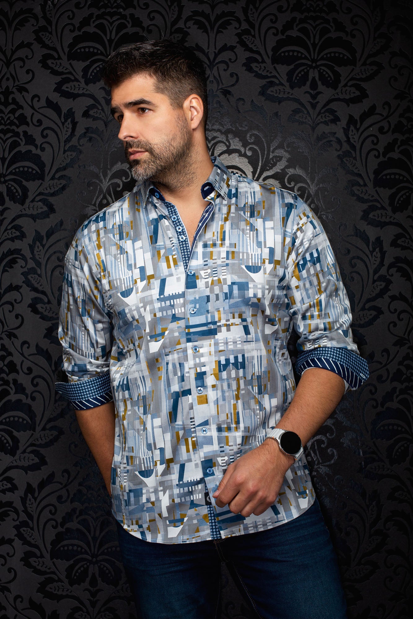 Au Noir men's gray geometric print button-up shirt with rolled contrast cuffs and blue buttons, front view