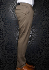 Au Noir men's side-back view of taupe chino pants with belt loops, rear welt pocket, and small logo tag