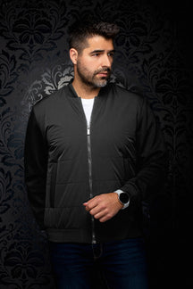 Men's black bomber jacket front view with quilted body, zip closure, and rib knit trims by Au Noir