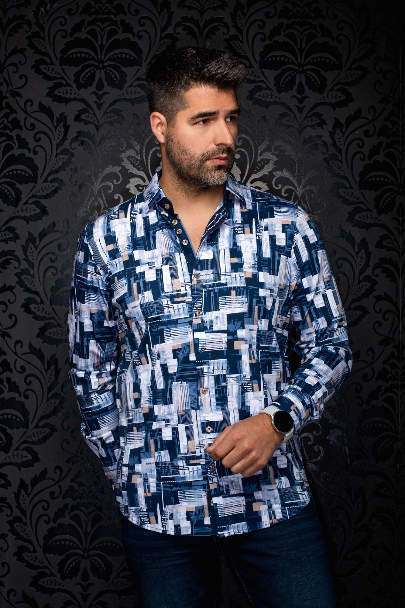 Au Noir men's navy button-up shirt with white geometric print, tan buttons, and long sleeves, front model view