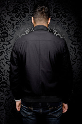 Au Noir men's black bomber jacket with ribbed collar, waistband, back yoke and center seam, back view