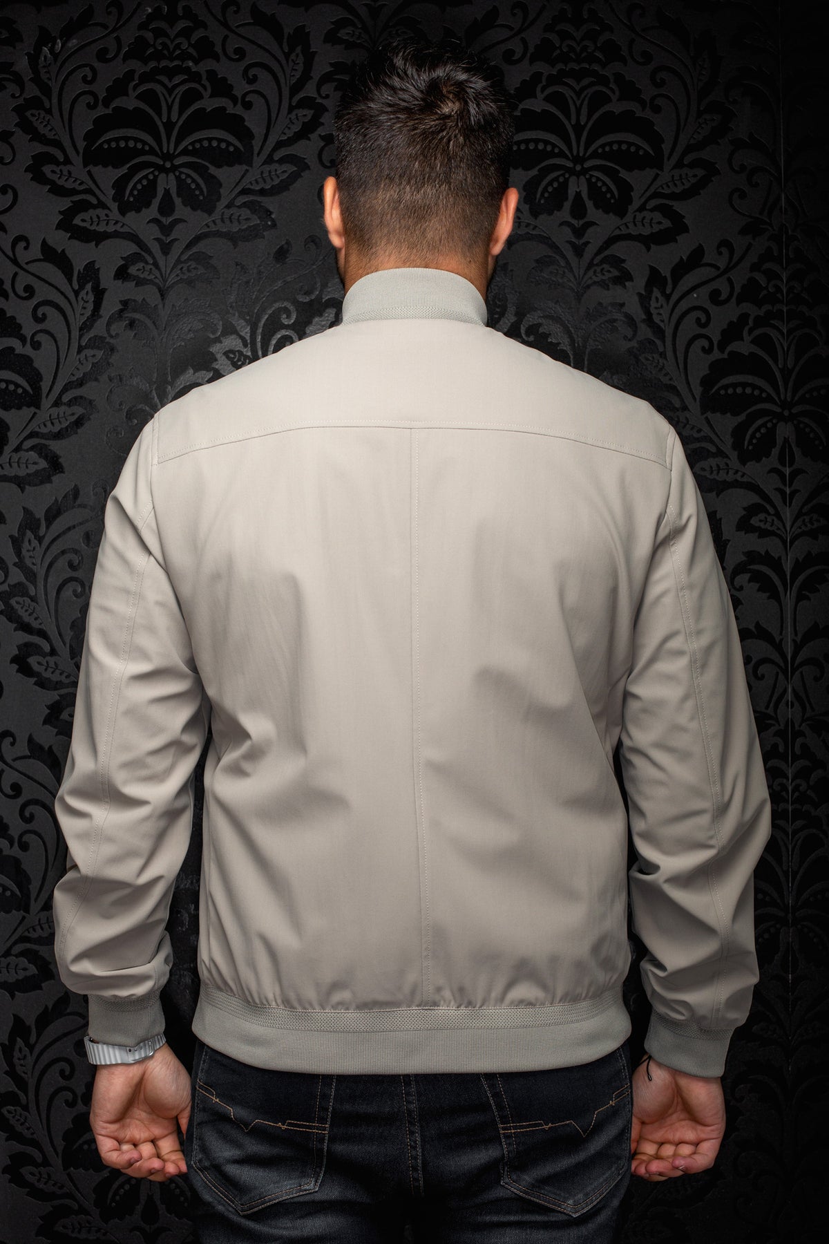 Au Noir men's light gray bomber jacket with ribbed collar, cuffs, hem, and center back seam, back view