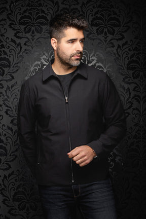 Au Noir men's black zip-front bomber jacket with pointed collar, long sleeves, and banded hem, front model view