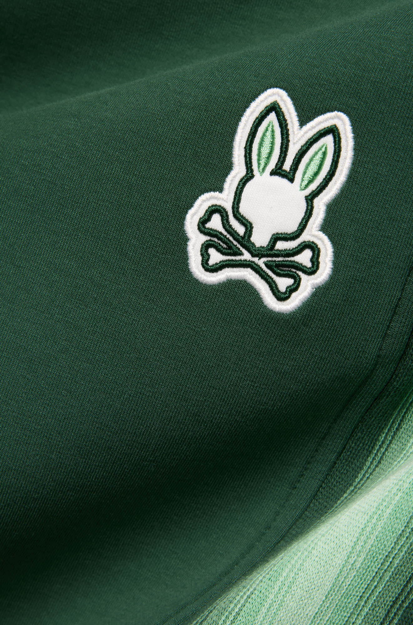 Psycho Bunny men's dark green sweatpants, detail view