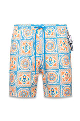 Psycho Bunny men's cream swim shorts with blue drawstring and orange-blue tile print shown from the front