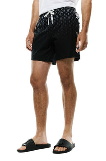 Psycho Bunny men's black swim shorts with side tag, gradient bunny skull print and white drawstring shown from the front
