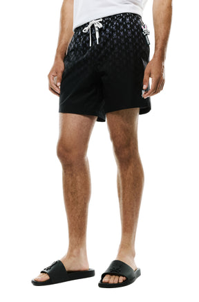 Psycho Bunny men's black swim shorts with side tag, gradient bunny skull print and white drawstring shown from the front