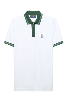 Men's white short sleeve polo with chest bunny logo, cuff trim, placket and green collar, product view by Psycho Bunny