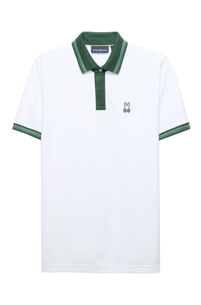Men's white short sleeve polo with chest bunny logo, cuff trim, placket and green collar, product view by Psycho Bunny