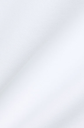 Psycho Bunny men's white short-sleeve polo, detail view