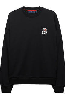 Men's black crewneck sweatshirt front view with ribbed trim and small bunny logo patch on the chest by Psycho Bunny