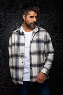 Au Noir men's off-white plaid overshirt on model, front view with black snaps and chest flap pocket