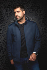 Au Noir men's navy bomber jacket worn open, front view with herringbone texture and ribbed cuffs