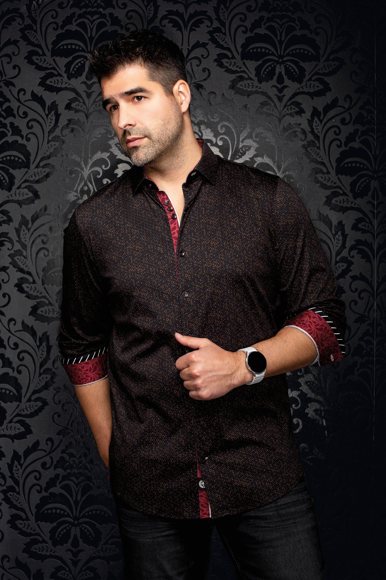 Au Noir men's black shirt with brown micro pattern, front model view with rolled red and striped cuffs
