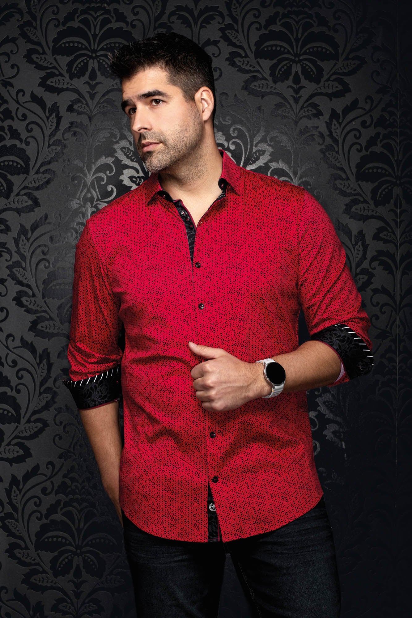 Au Noir men's angled front view of red button-up shirt with black microprint and rolled contrast cuffs
